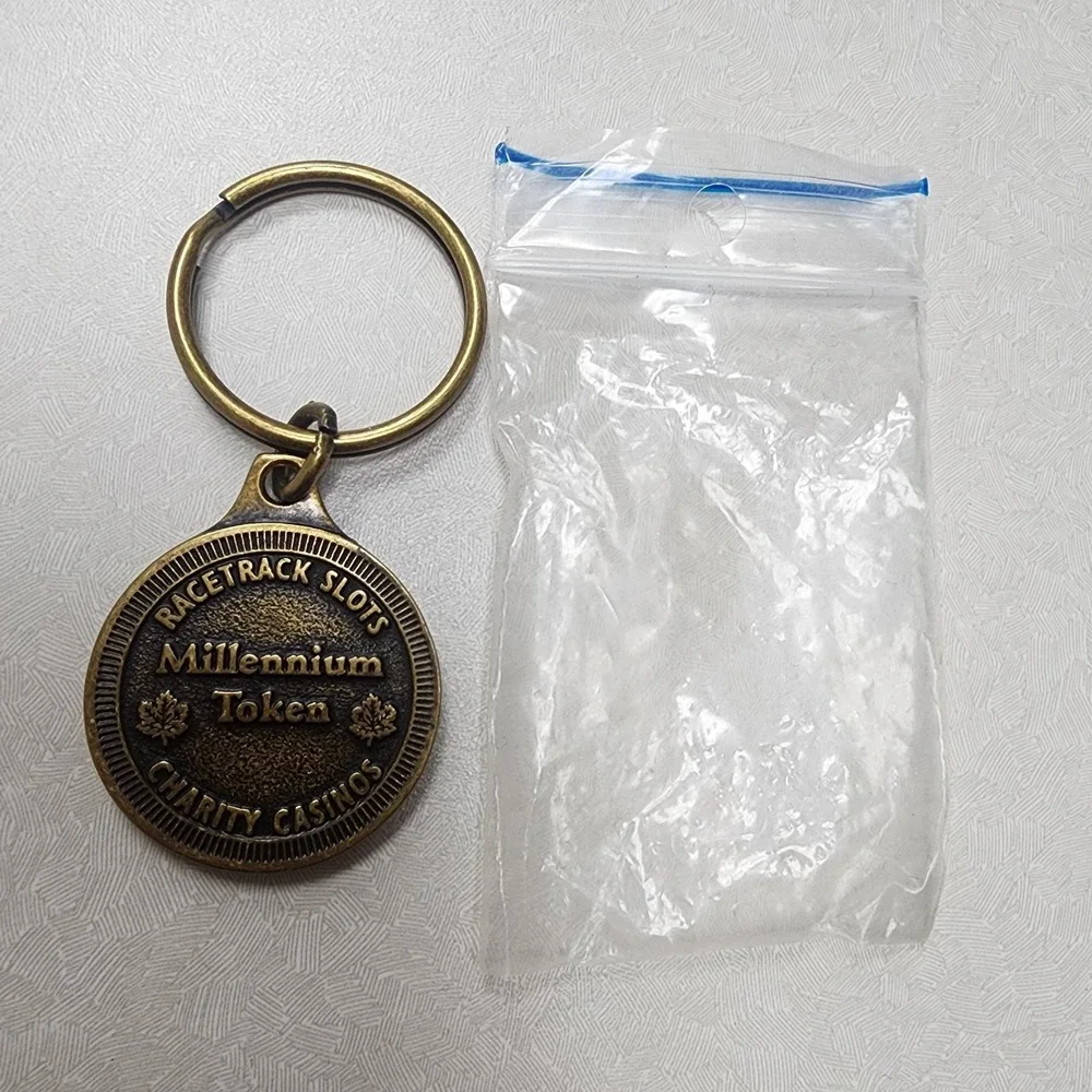 Ontario Lottery Corp 2000 Millennium Token Keyring Charity Casino Racetrack Slot